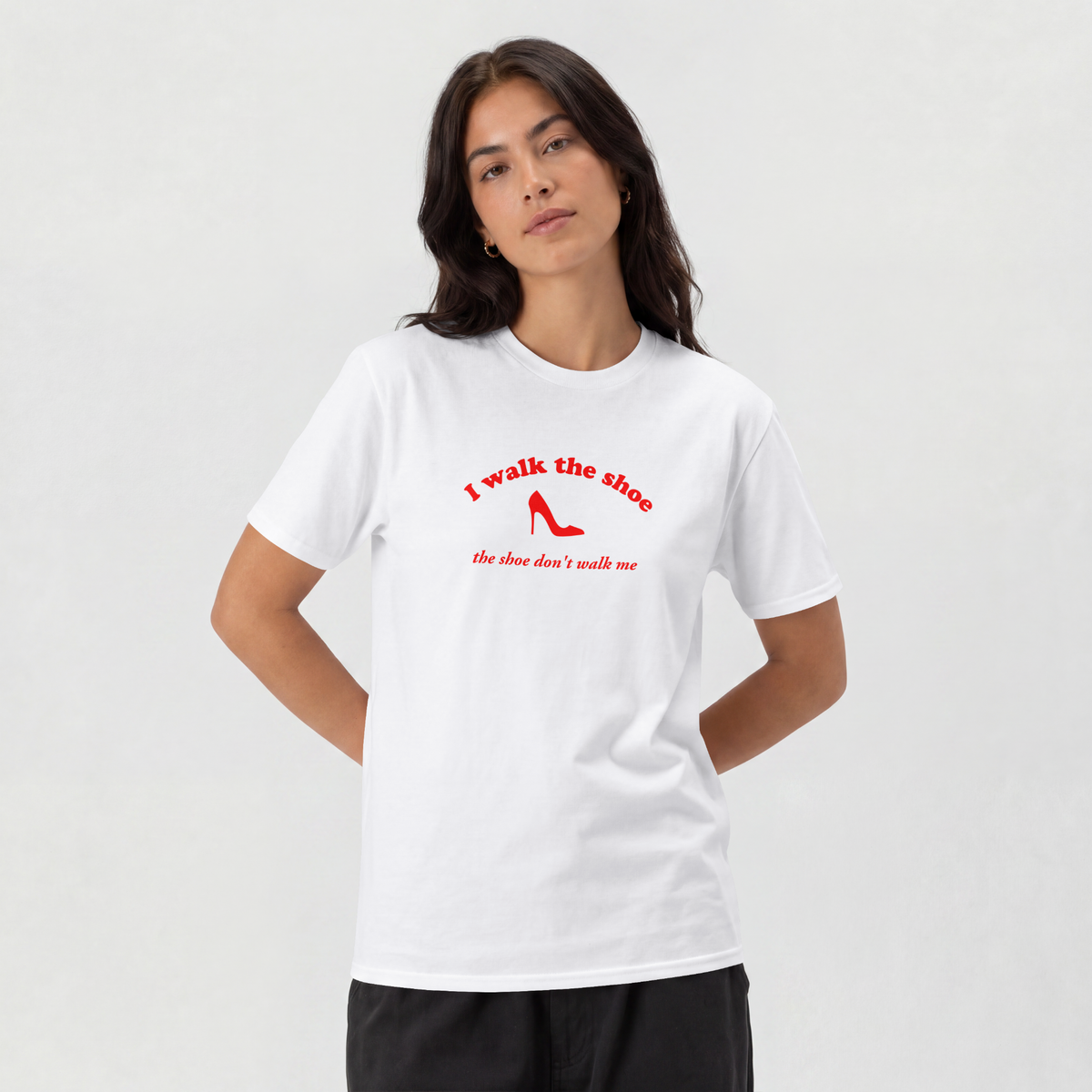 I Walk The Shoe meme slogan printed across a unisex t-shirt