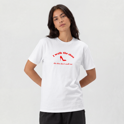 I Walk The Shoe meme slogan printed across a unisex t-shirt